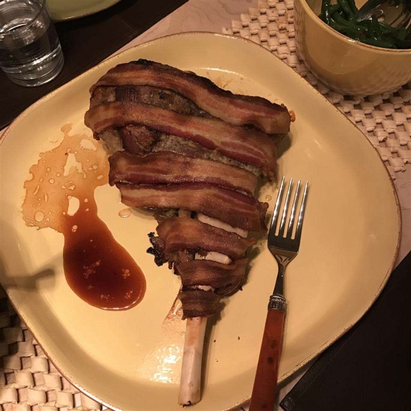 Bacon-Wrapped Leg of Lamb with Red Wine Reduction