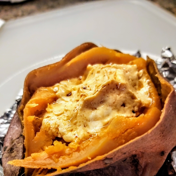 Baked Sweet Potatoes with Chipotle-Honey Butter