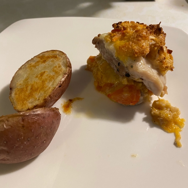 Stuffed Chicken Thighs with Roasted Potatoes and Carrots