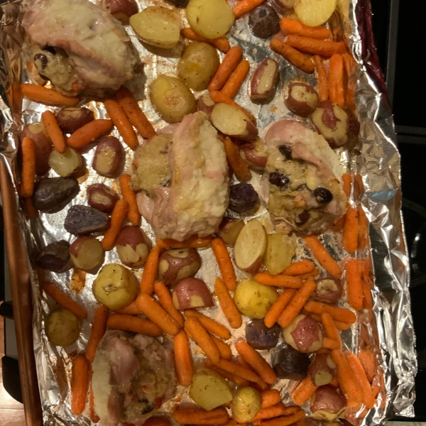 Stuffed Chicken Thighs with Roasted Potatoes and Carrots