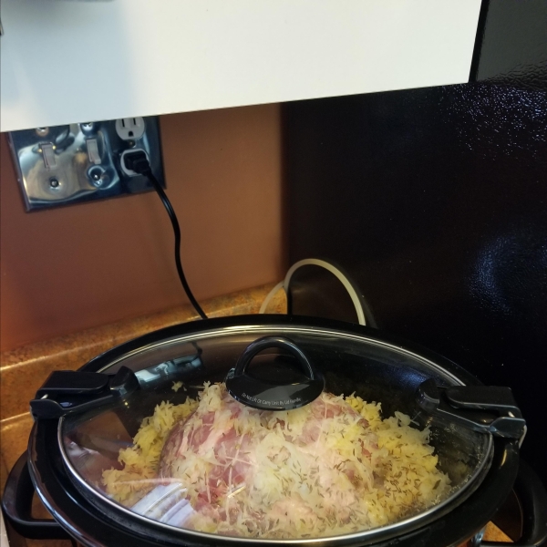 Slow Cooker German-Style Pork Roast with Sauerkraut and Potatoes