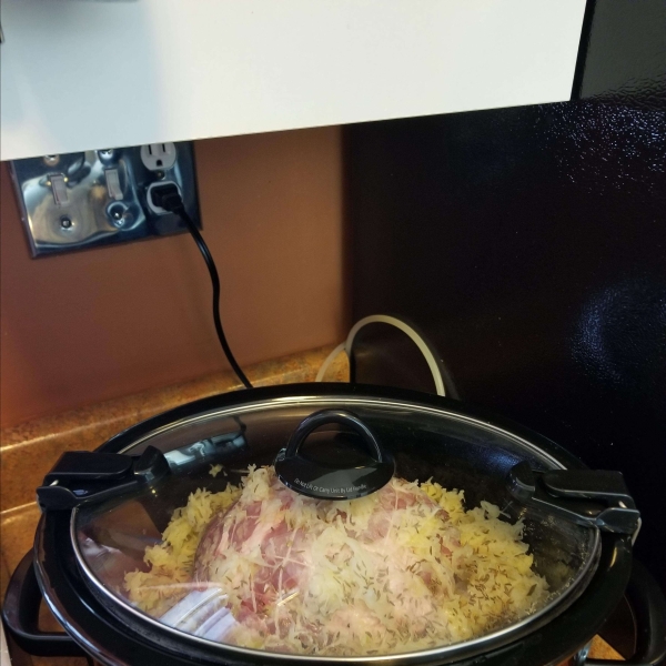 Slow Cooker German-Style Pork Roast with Sauerkraut and Potatoes